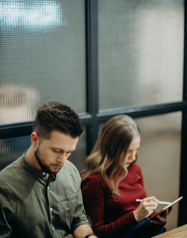 A male and female studying